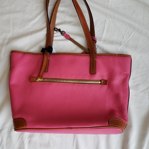 Dooney & Bourke Handbags - Dooney and Bourke pink purse Never Used With Tags